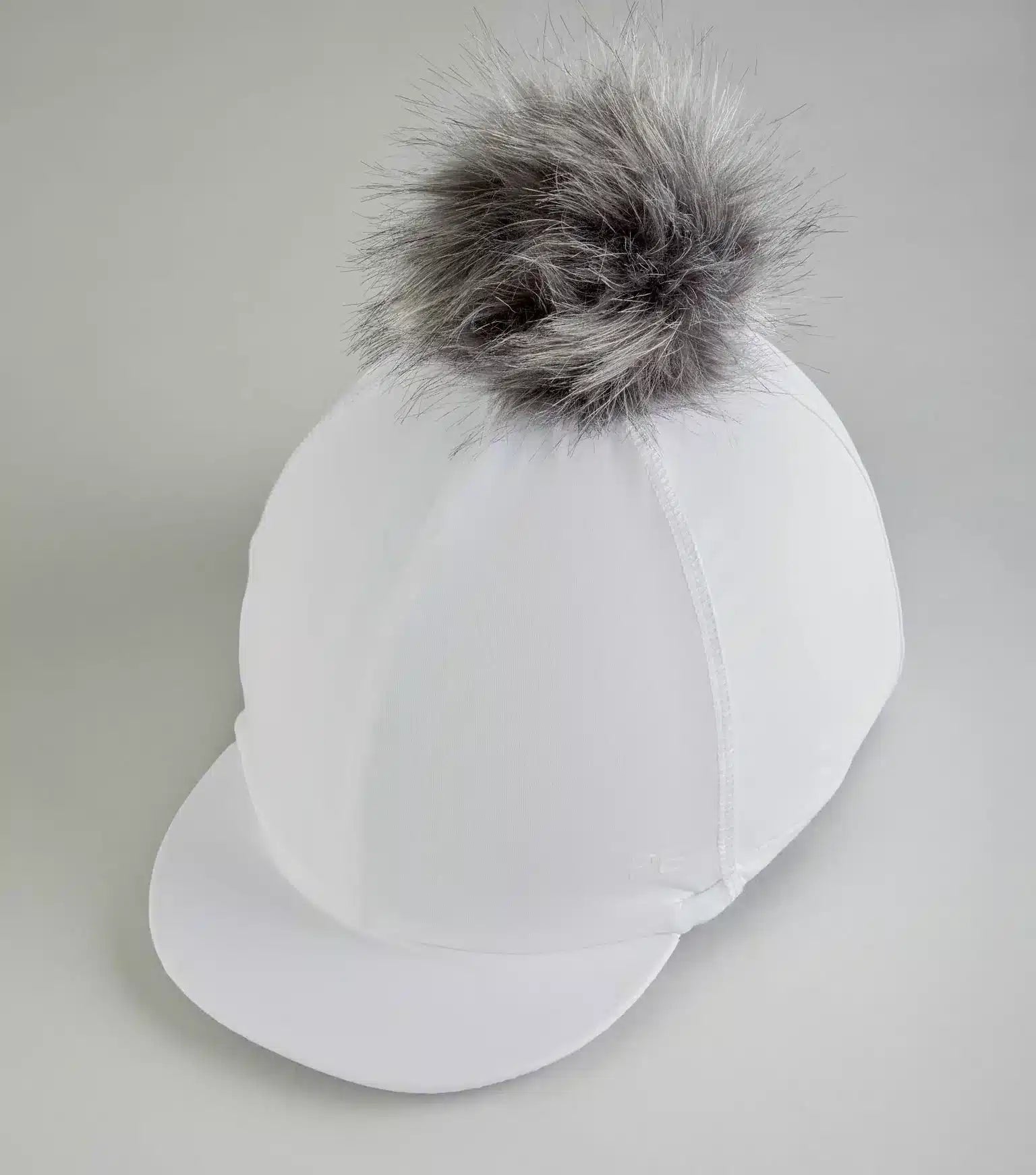 Premier Equine Jersey Hat Silk with Faux Fur Pom Pom by Premier Equine at Try a Bit