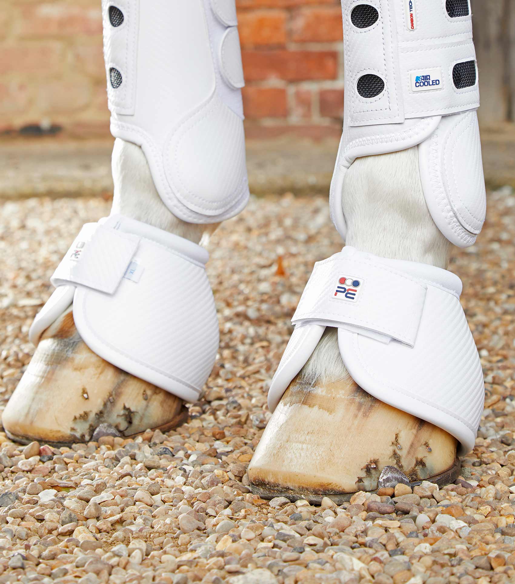 Premier Equine Carbon Tech Kevlar No-Turn Over Reach Boots by Premier Equine at  Try a Bit