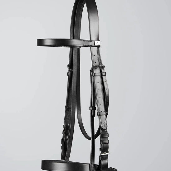 PExercise / Racing Bridle with Plain Caveson Noseband Dark Havana by Premier Equine Int. Ltd. at  Try A Bit