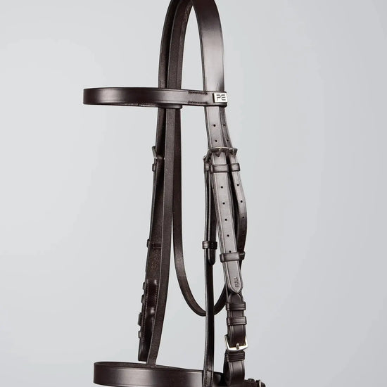 PExercise / Racing Bridle with Plain Caveson Noseband Dark Havana by Premier Equine Int. Ltd. at  Try A Bit
